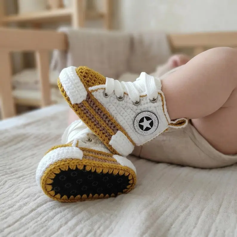 Mustard and white handmade crochet baby sneaker booties